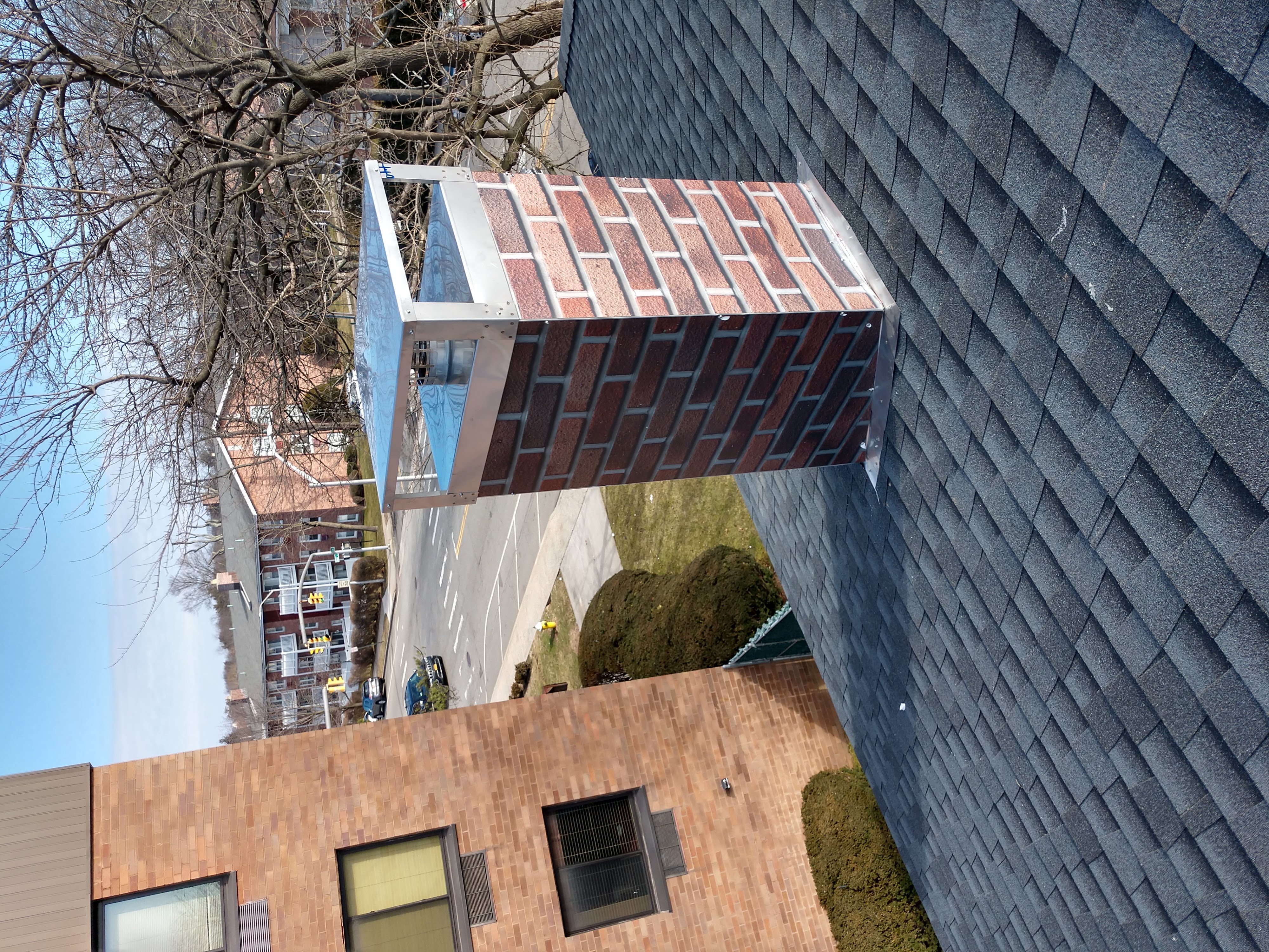 New elastomeric sealant applied to chimney crown in East Northport, NY