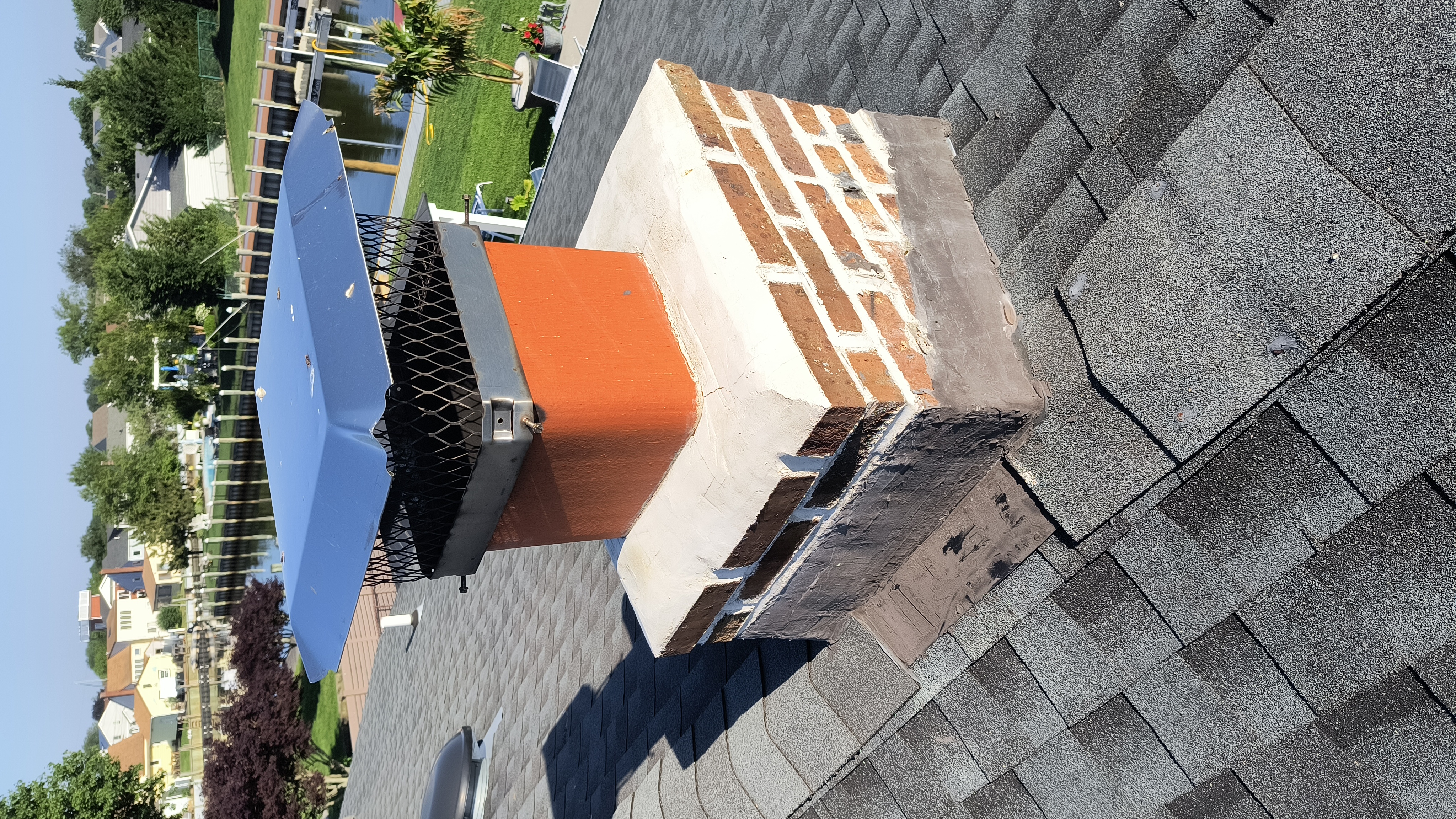 Full chimney masonry rebuild and restoration in East Northport, NY