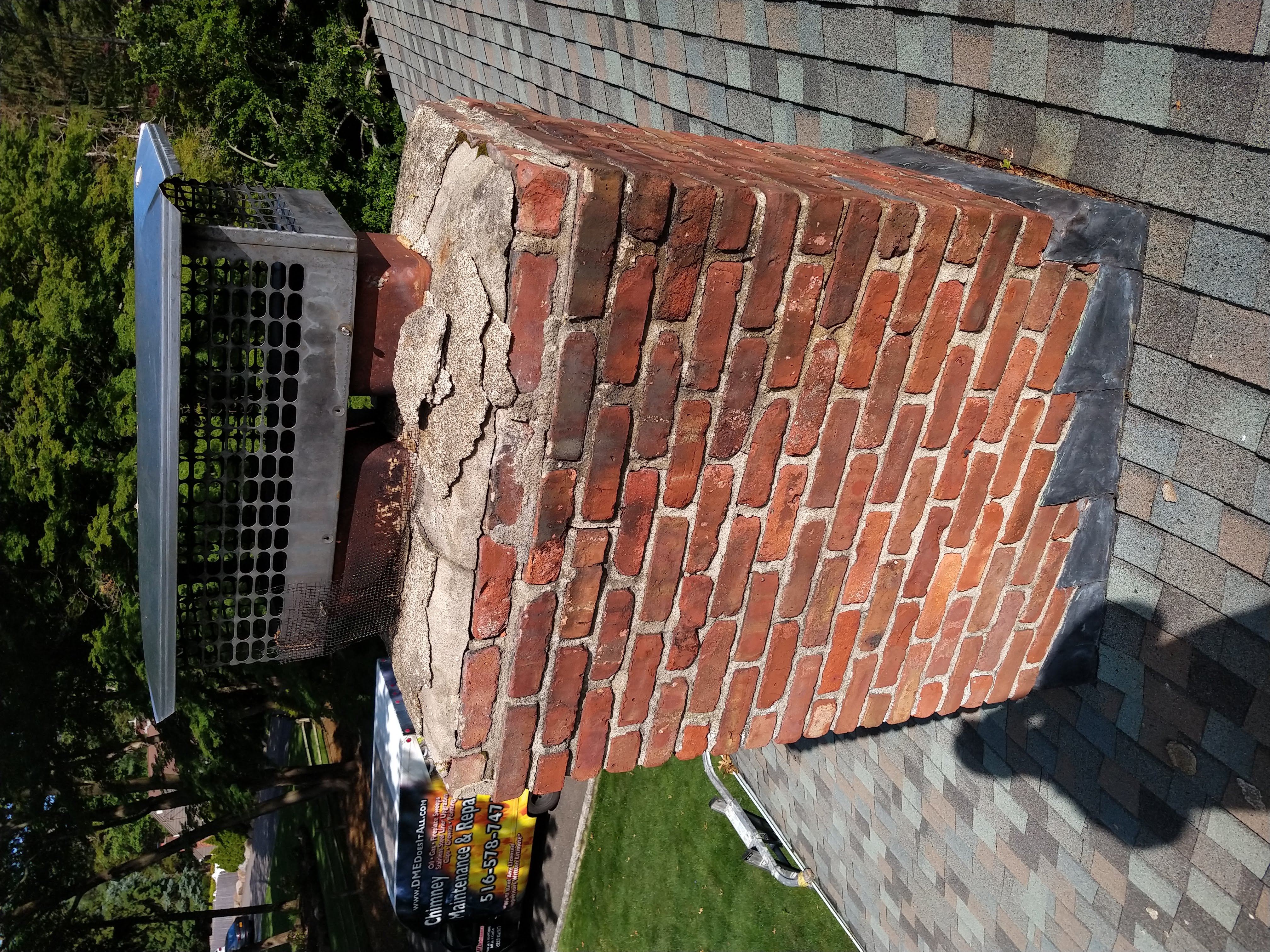 Cracked chimney crown professionally repaired in East Northport, New York