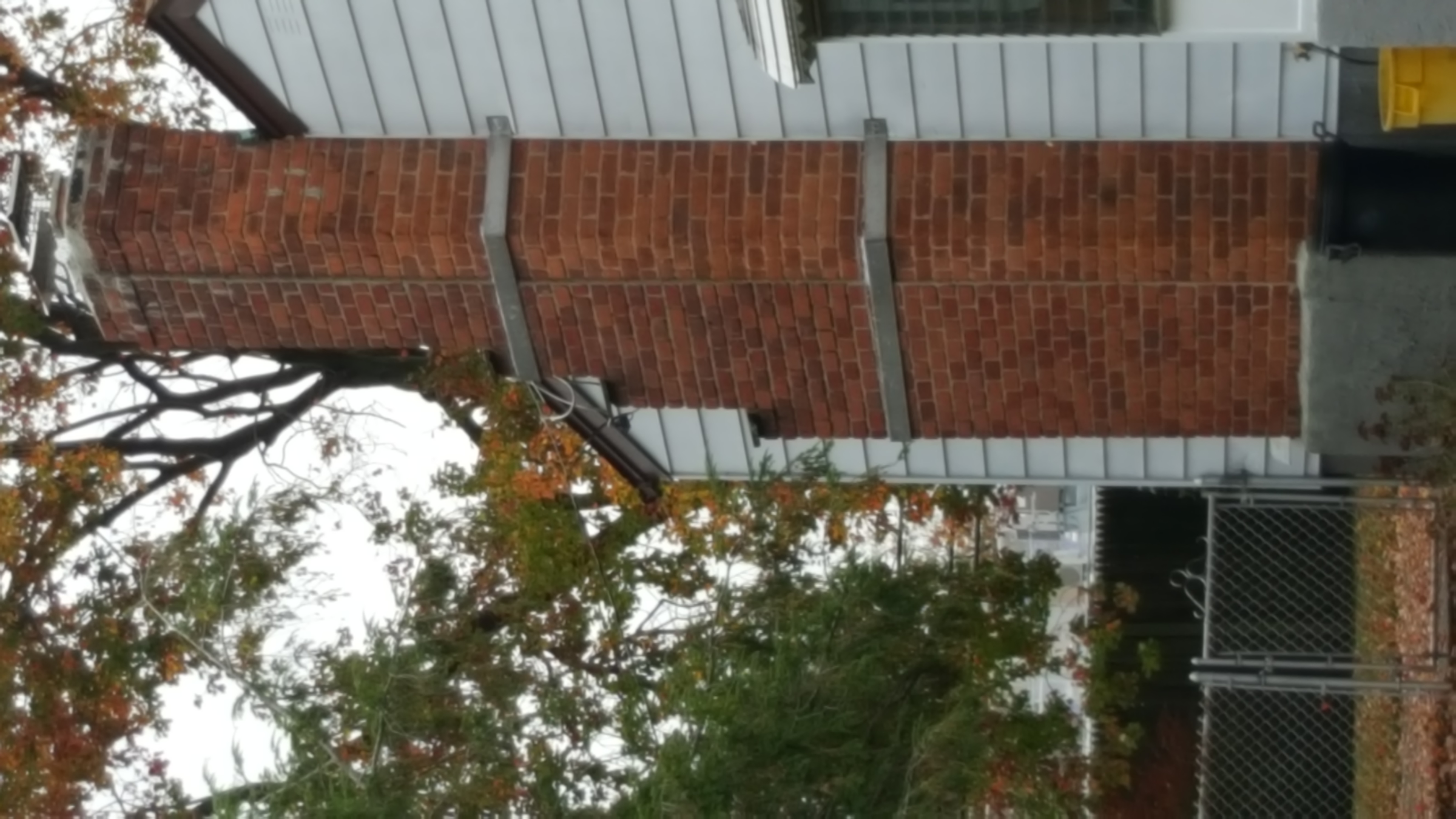 Heavy oil soot removal from chimney flue in East Northport, New York