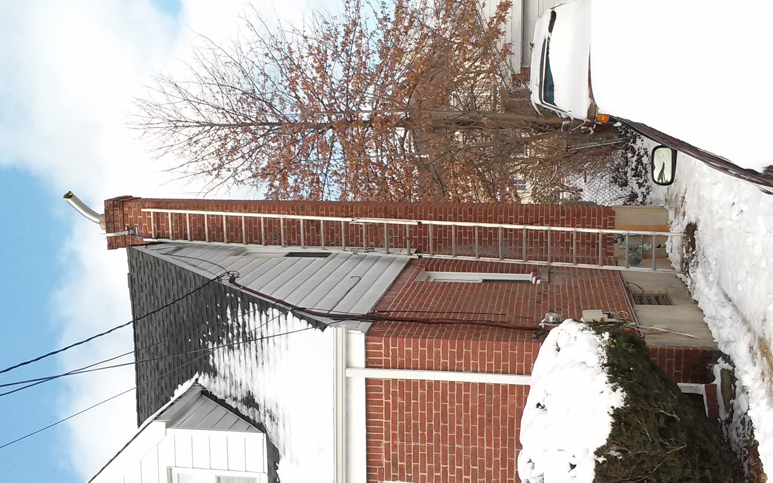 Stainless steel chimney liner installation in East Northport, NY